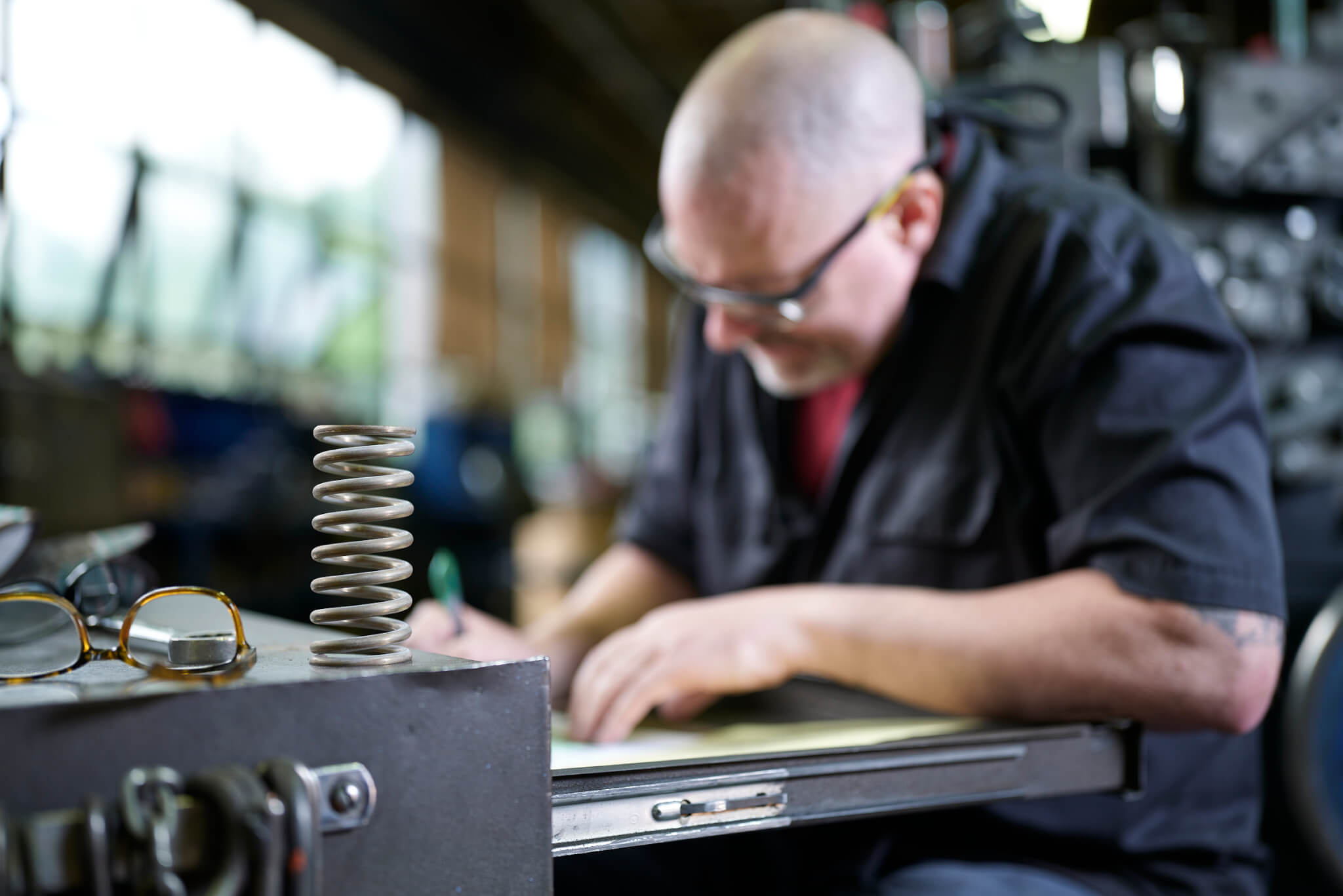 spring coiler recording results of a compression spring